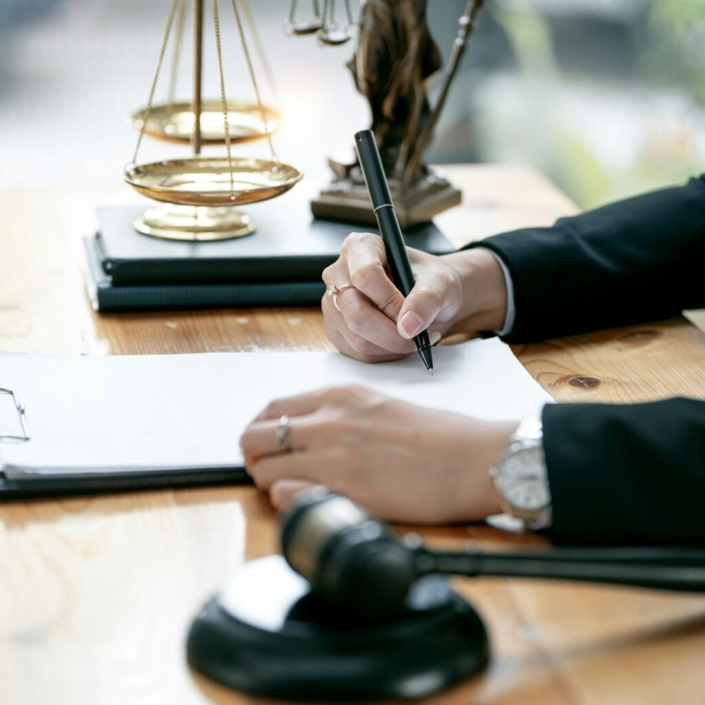 Justice lawyers, Businesswoman in suit or lawyer working on a documents.